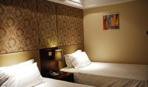 Baolong Homelike Hotel - Wusong Branch Sanghaj Szoba fotó